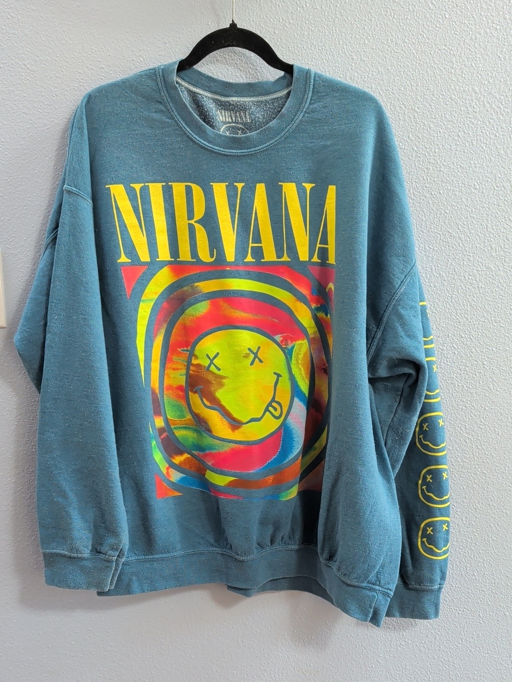 NIRVANA Teal Crewneck with Yellow Multicolor Smiley Face Graphic